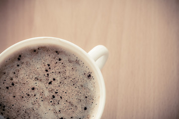 Beverage. Cup of hot drink coffee with froth.