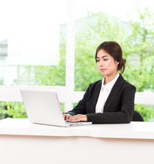 Business woman using computer laptop