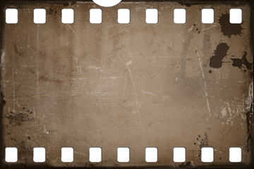 grunge scratched film strip background