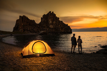 Camping at lake and beautiful sunset - obrazy, fototapety, plakaty