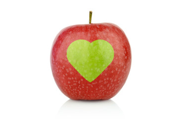 Studio shot of red apple with health heart sign
