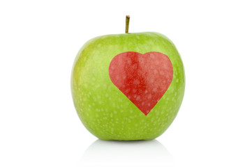 Studio shot of green apple with health heart sign