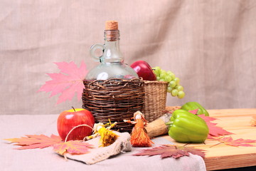 fruits, wine and autumn leaves