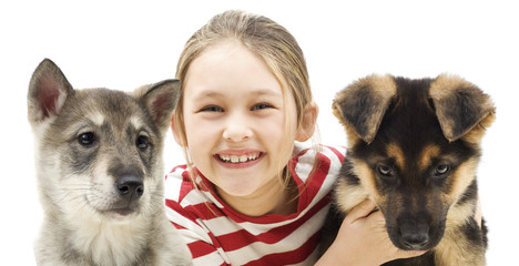 child and puppies