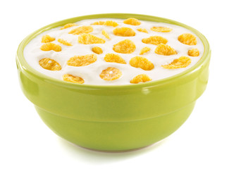 corn flakes in bowl on white