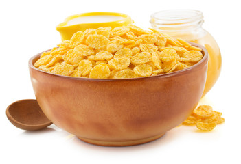 corn flakes in bowl on white