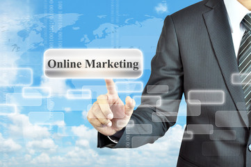 Businessman hand touching Online Marketing on virtual screen