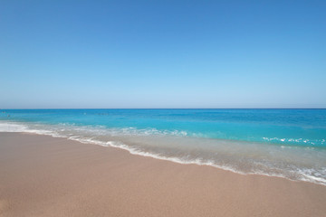 Sandy long beach with turquoise waters