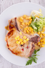 pork chop and corn sauce