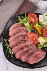 meat sliced and salad