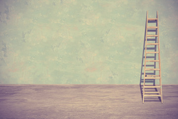 Ladder leaning against a wall