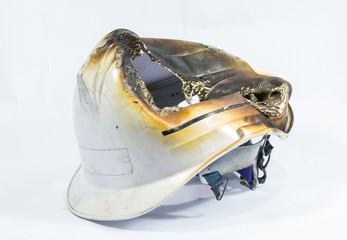 safety helmet on white background. damage by heat and fire