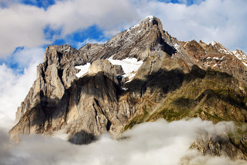 Wetterhorn Peak (3692m) over Grindelwald village, Switzerland