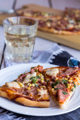 slices of pizza on a white plate