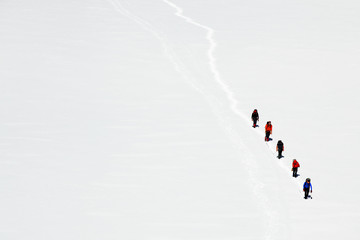 Team of alpinists crossing a glacier © Rechitan Sorin