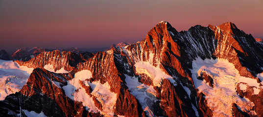Sunset light over Schreckhorn Peak, Switzerland - UNESCO Heritage