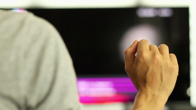 Woman interacting with futuristic touch screen