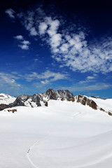 Team of alpinists crossing a glacier