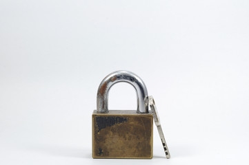 Single padlock with key on white background.