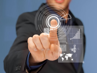 businessman in suit pressing virtual button