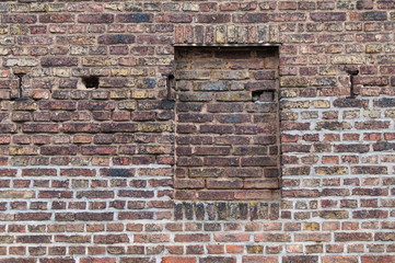 Wall of brick with a walled up window texture