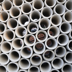 Concrete pipes stacking, background and pattern