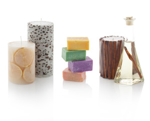 Spa oil in bottles with scented candles and soaps. With PS paths