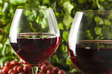 Fotobehang Refreshing Red Wine In a Glass © Brent Hofacker