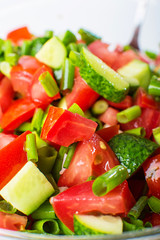 vegetable salad with fresh tomatoes cucumbers and green onions