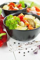 Steamed vegetables in the ceramic pot