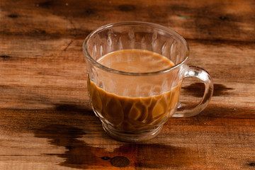 coffee cups on wood background.