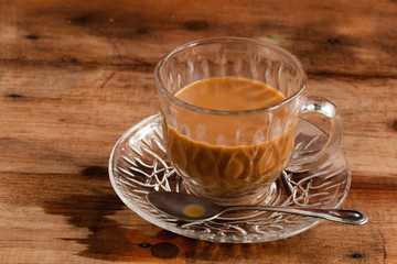 coffee cups on wood background.