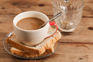 cup of coffee and Whole Wheat Bread.