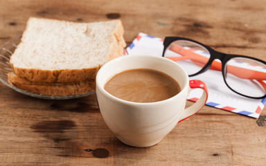 cup of coffee and Whole Wheat Bread.