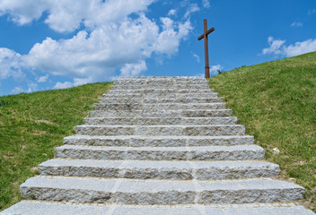 Cross and stone stairs