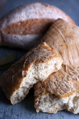 Fresh baked bread on wooden background