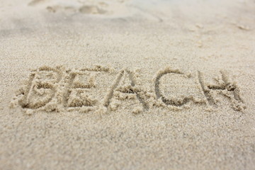 Beach written in the sand