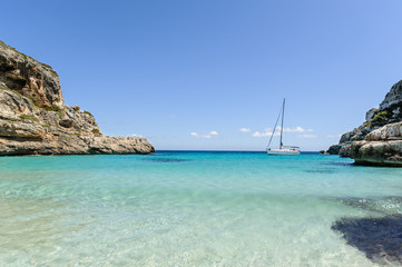 Fototapeta premium Sailing yacht on anchor in beautiful Mediterranean bay