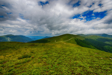 beautiful mountain landscape with dramatic clouds