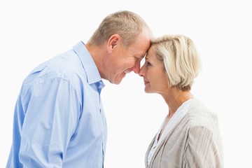 Happy mature couple facing each other