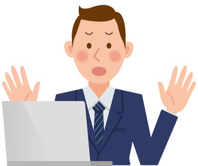 パソコンをするビジネスマン　降参