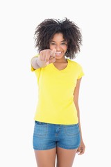 Pretty girl in yellow tshirt and hot pants