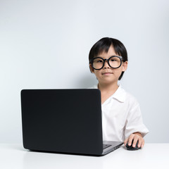 School girl using laptop