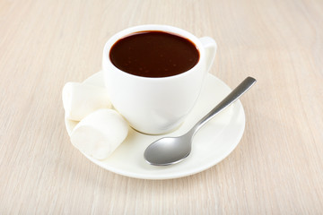 Obraz na płótnie Canvas Cup of hot chocolate on table, close up