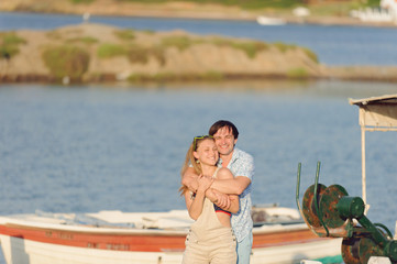 Hugging Couple on Pier