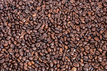 many roasted coffee beans background