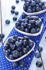 Delicious blueberries on table close-up