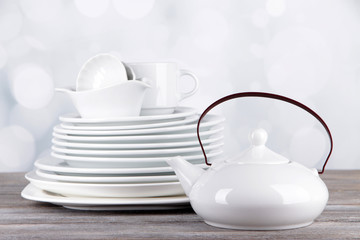 White crockery and kitchen utensils,