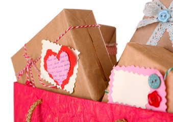 Present boxes in paper bag close up