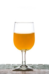 Pouring orange juice  from bottle into glass